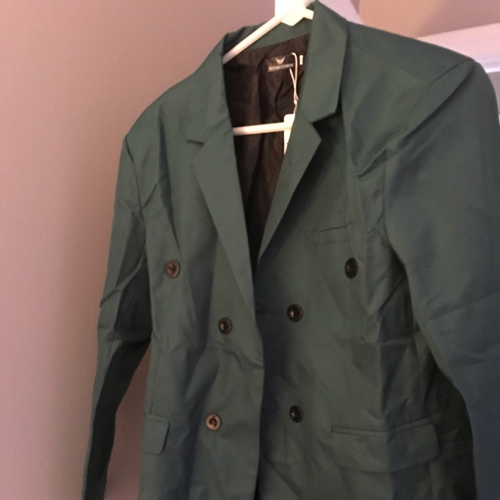 Double Breasted light weight blazer . Never worn